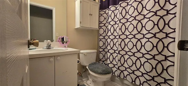a bathroom with a sink and a toilet