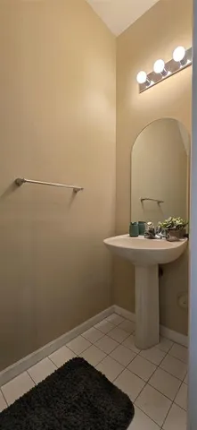 a bathroom with a sink toilet and vanity