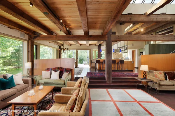 a outdoor living space with patio furniture and a fireplace