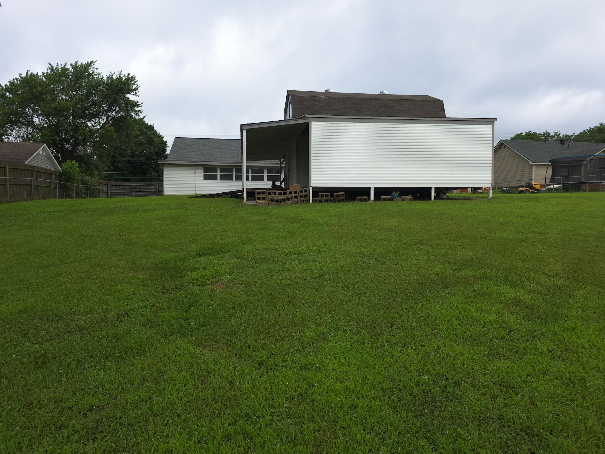 966 Beaver Road Munford, TN 38058 - Photo 32 of 32 Expansive green lawn providing ample outdoor space