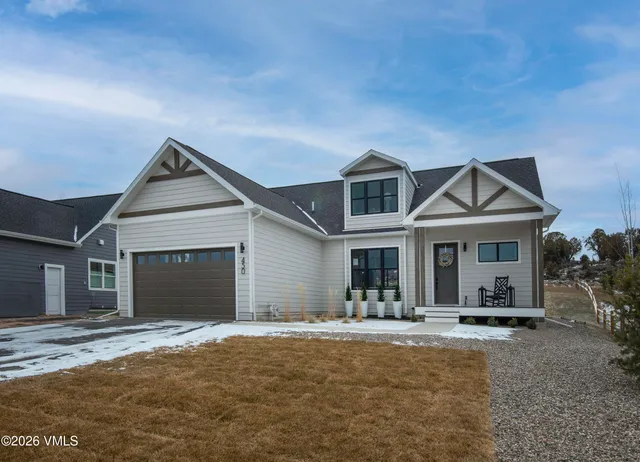 a black and white photo of a living room