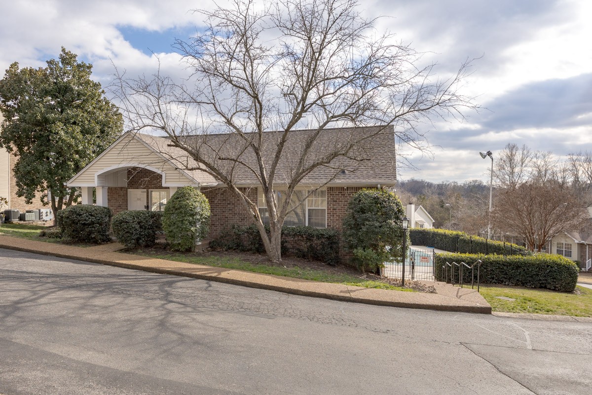 230 Pepper Ridge Circle Antioch, TN 37013 - Photo 17 of 21 a front view of a house with a yard and garage