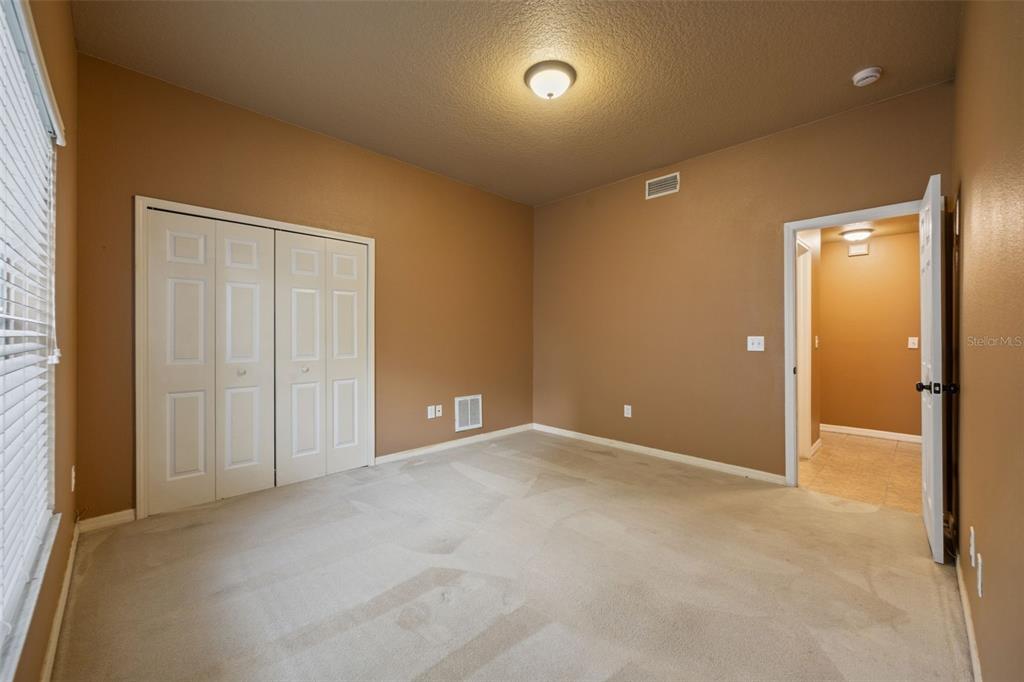 12112 Luftburrow Lane Hudson, FL 34669 - Photo 13 of 35 an empty room with closet area