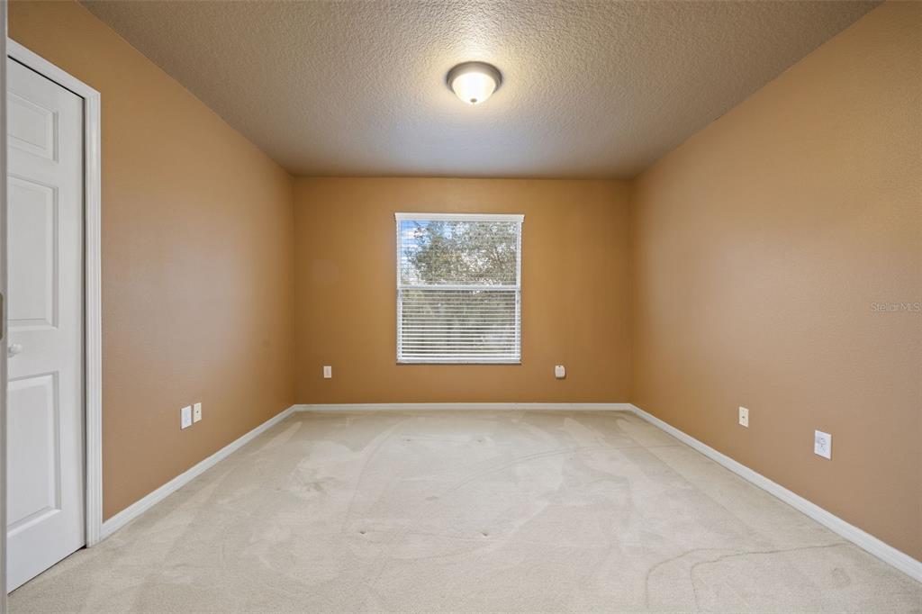 12112 Luftburrow Lane Hudson, FL 34669 - Photo 23 of 35 an empty room with a window