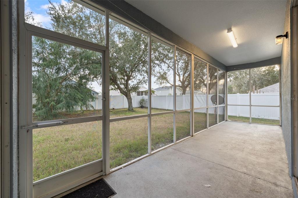 12112 Luftburrow Lane Hudson, FL 34669 - Photo 27 of 35 a view of outdoor space with wooden floor and windows