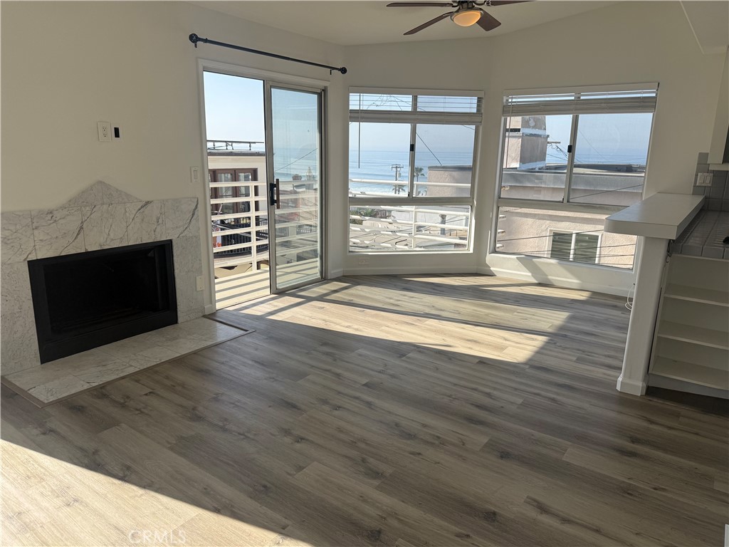 205 Shell Street Manhattan Beach, CA 90266 - Photo 3 of 7 a view of livingroom with furniture wooden floor and window