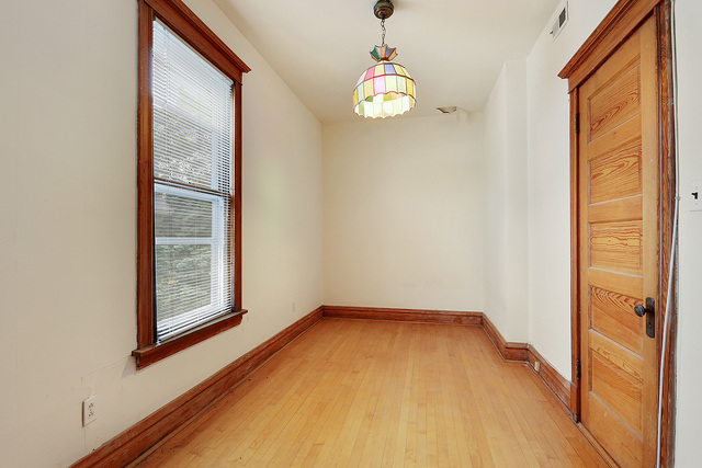 1745 West School Street Chicago, IL 60657 - Photo 9 of 12 a view of empty room with window