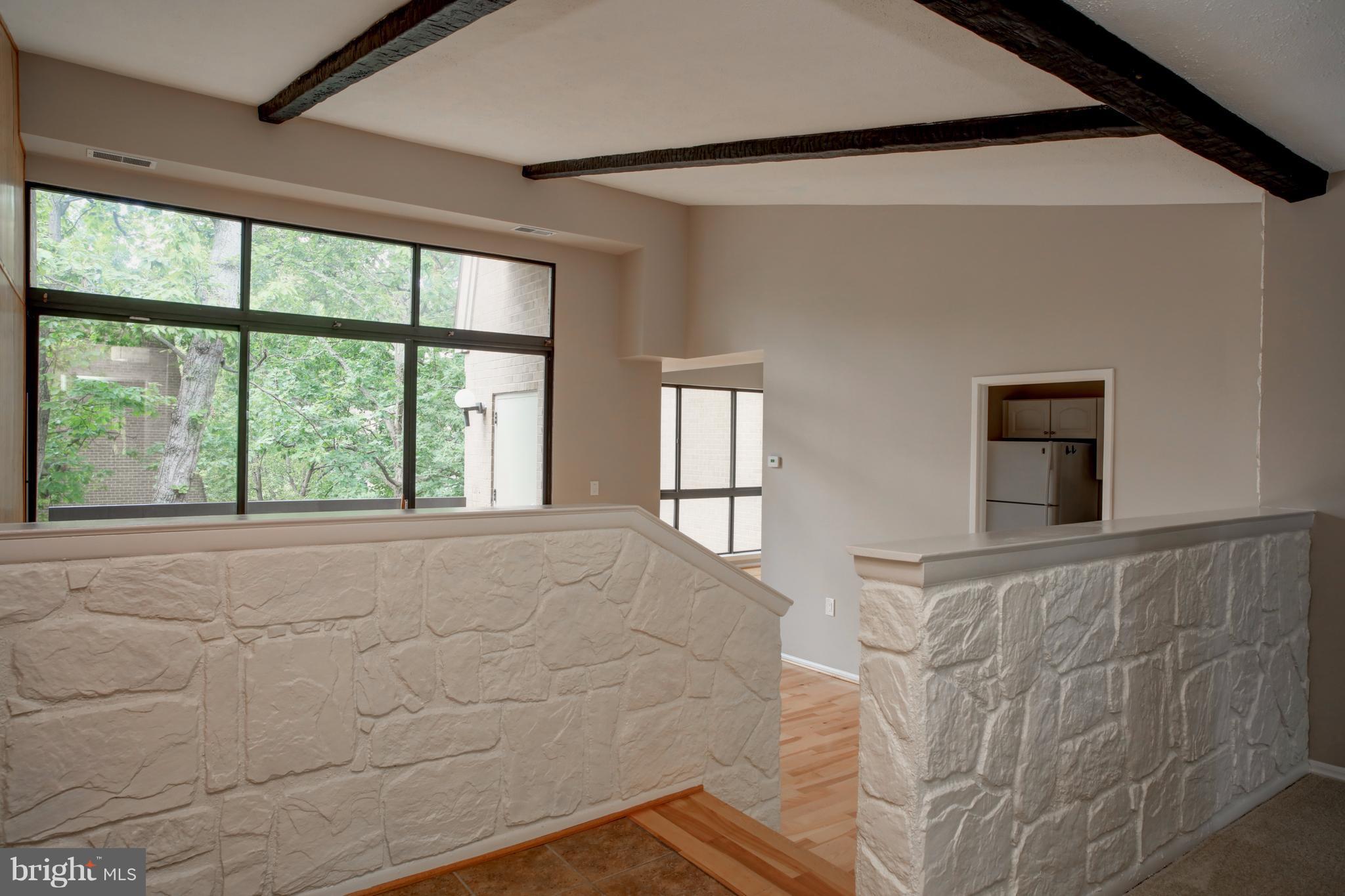 11616 Ivystone Court, Unit 301 Reston, VA 20191 - Photo 12 of 29 a view of an empty room with a window