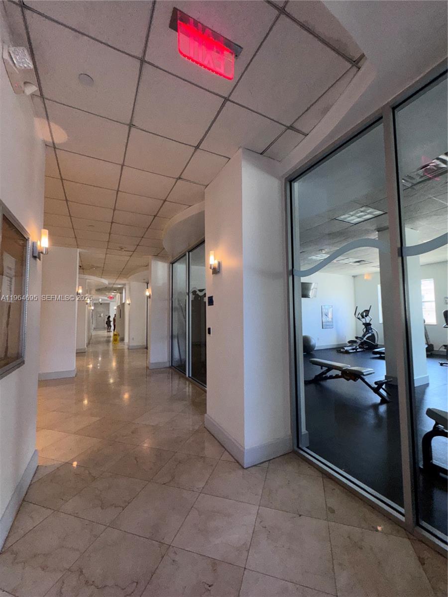 401 69th Street, Unit 607 Miami Beach, FL 33141 - Photo 21 of 89 a view of a hallway