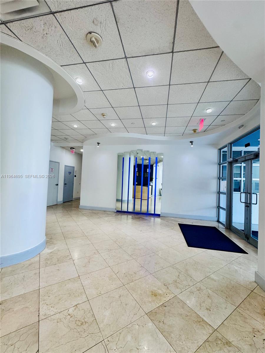 401 69th Street, Unit 607 Miami Beach, FL 33141 - Photo 26 of 89 a view of an empty room with a garage