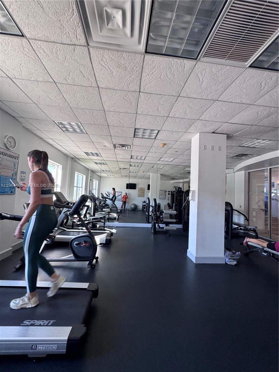 401 69th Street, Unit 607 Miami Beach, FL 33141 - Photo 30 of 89 a view of a room with gym equipment