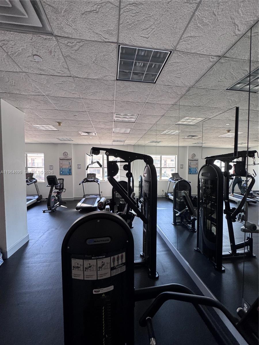 401 69th Street, Unit 607 Miami Beach, FL 33141 - Photo 35 of 89 a view of a gym with lots of gym equipment