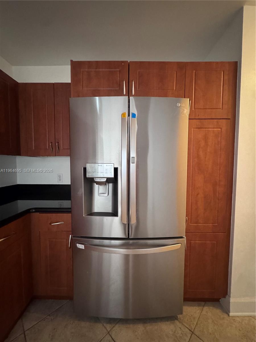 401 69th Street, Unit 607 Miami Beach, FL 33141 - Photo 6 of 89 a white refrigerator freezer sitting in a kitchen