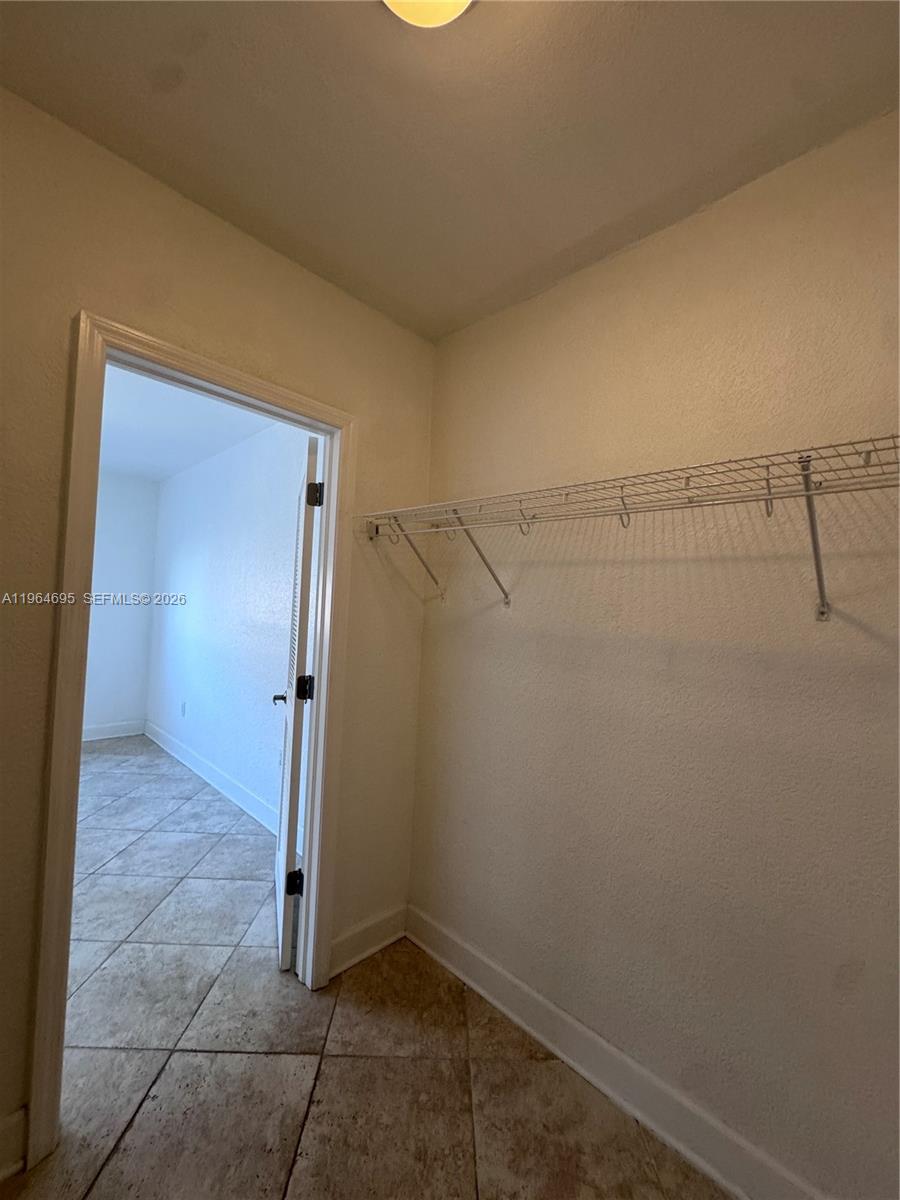 401 69th Street, Unit 607 Miami Beach, FL 33141 - Photo 65 of 89 wooden floor in an empty room