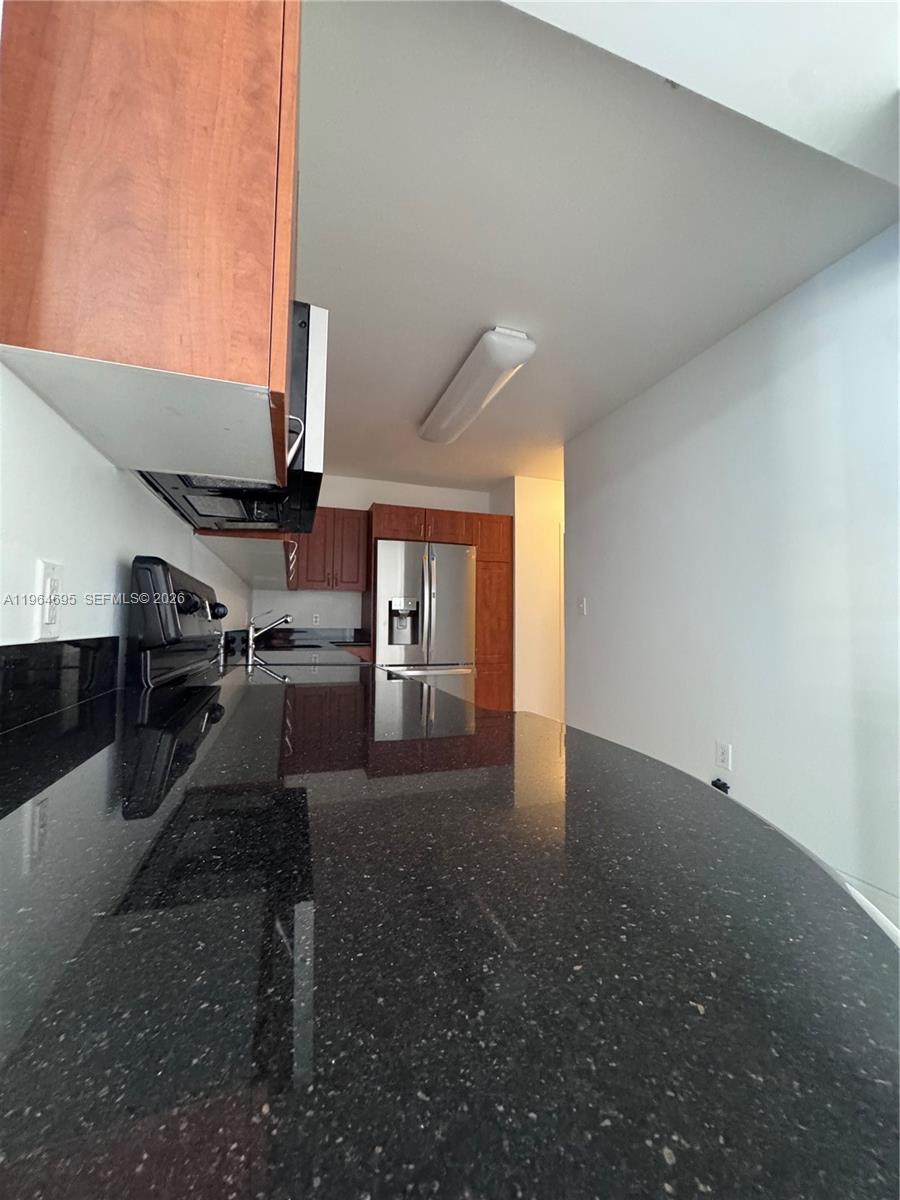 401 69th Street, Unit 607 Miami Beach, FL 33141 - Photo 69 of 89 a view of a living room hardwood and kitchen