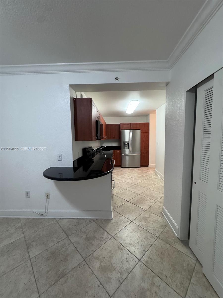 401 69th Street, Unit 607 Miami Beach, FL 33141 - Photo 72 of 89 a view of a kitchen with a sink