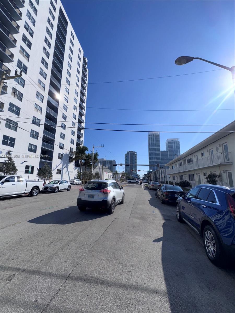 401 69th Street, Unit 607 Miami Beach, FL 33141 - Photo 84 of 89 a view of a cars park in front of a building