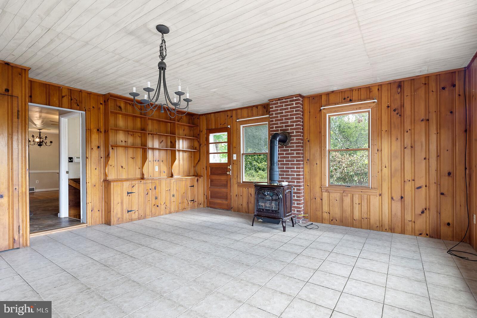 57 Elk Forest Road Elkton, MD 21921 - Photo 2 of 21 Family room with built in shelves, Propane stove.