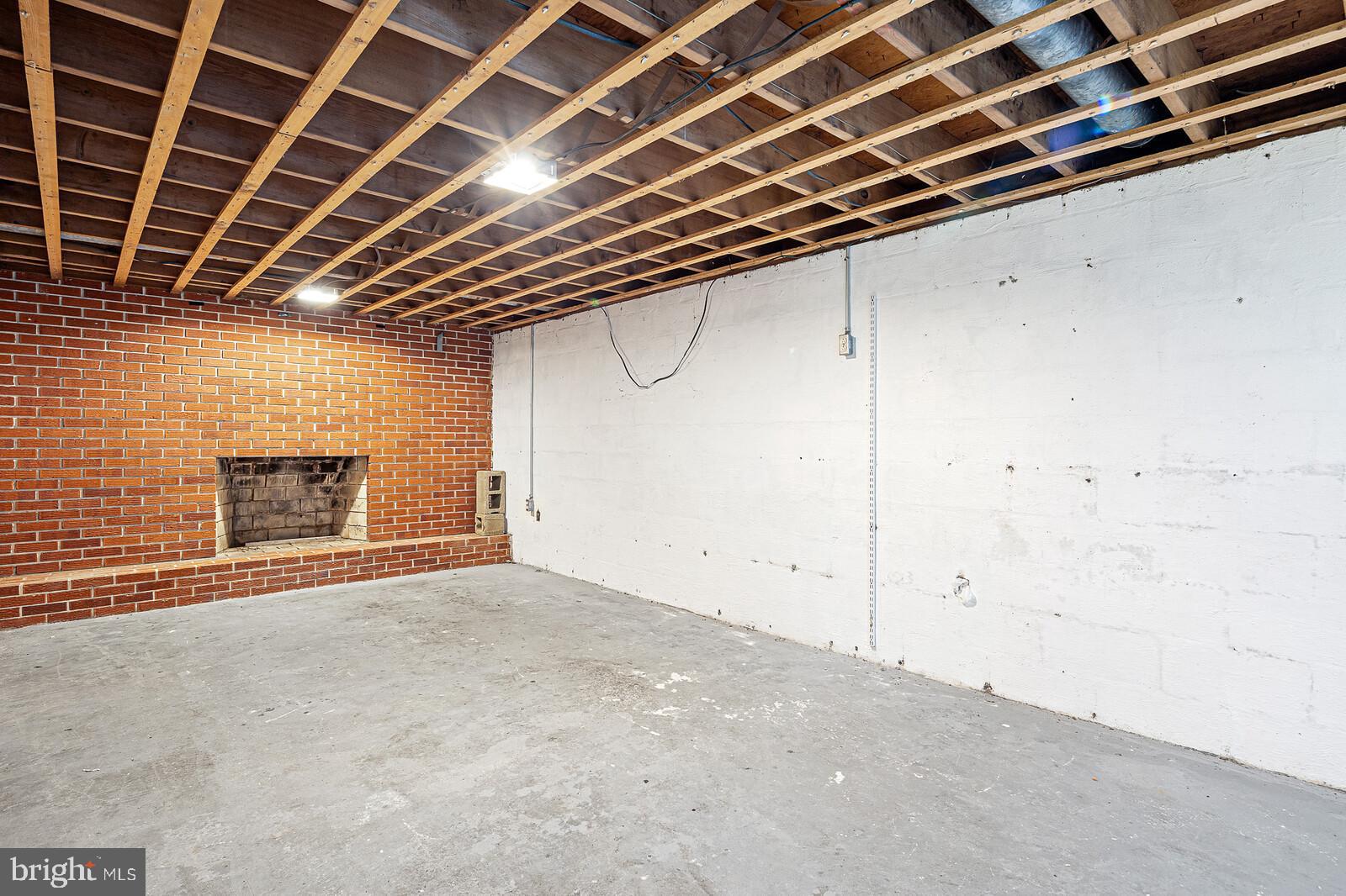 57 Elk Forest Road Elkton, MD 21921 - Photo 18 of 21 Woodburning fireplace in basement