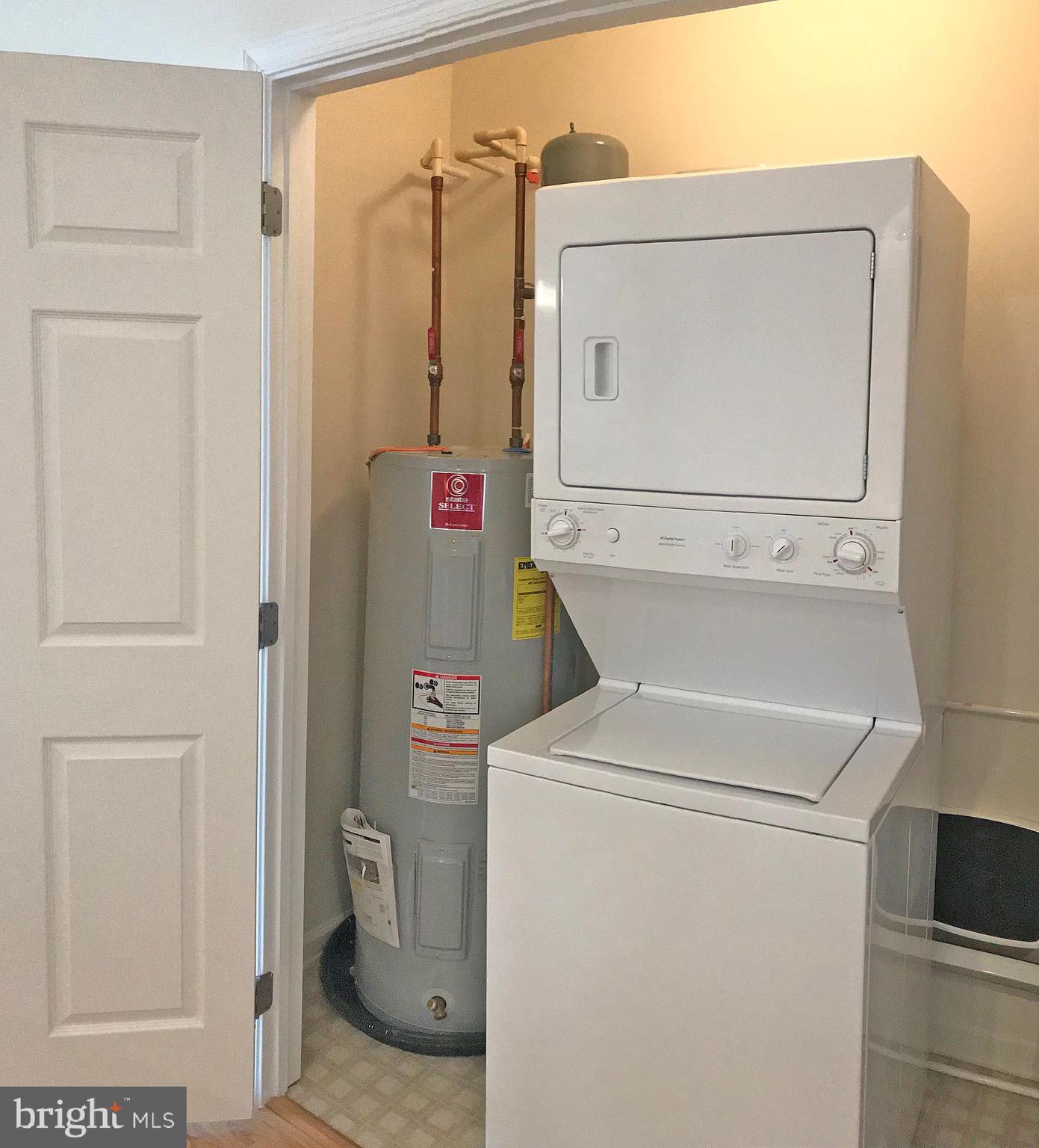 17476 Slipper Shell Way, Unit 10 Lewes, DE 19958 - Photo 13 of 29 Laundry Closet with Stack W&D