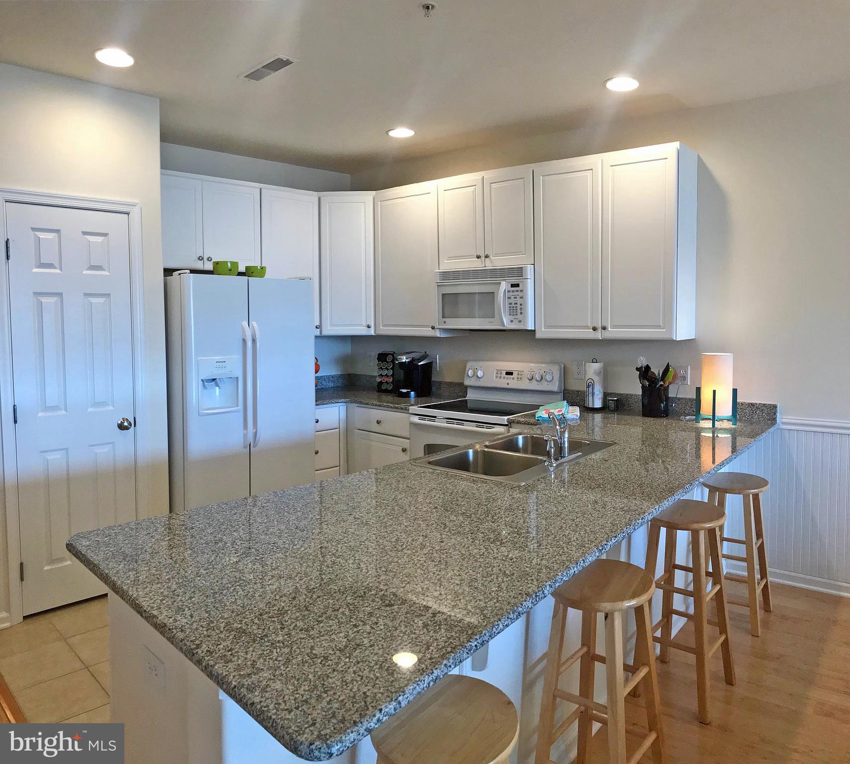 17476 Slipper Shell Way, Unit 10 Lewes, DE 19958 - Photo 8 of 29 Breakfast Bar Kitchen