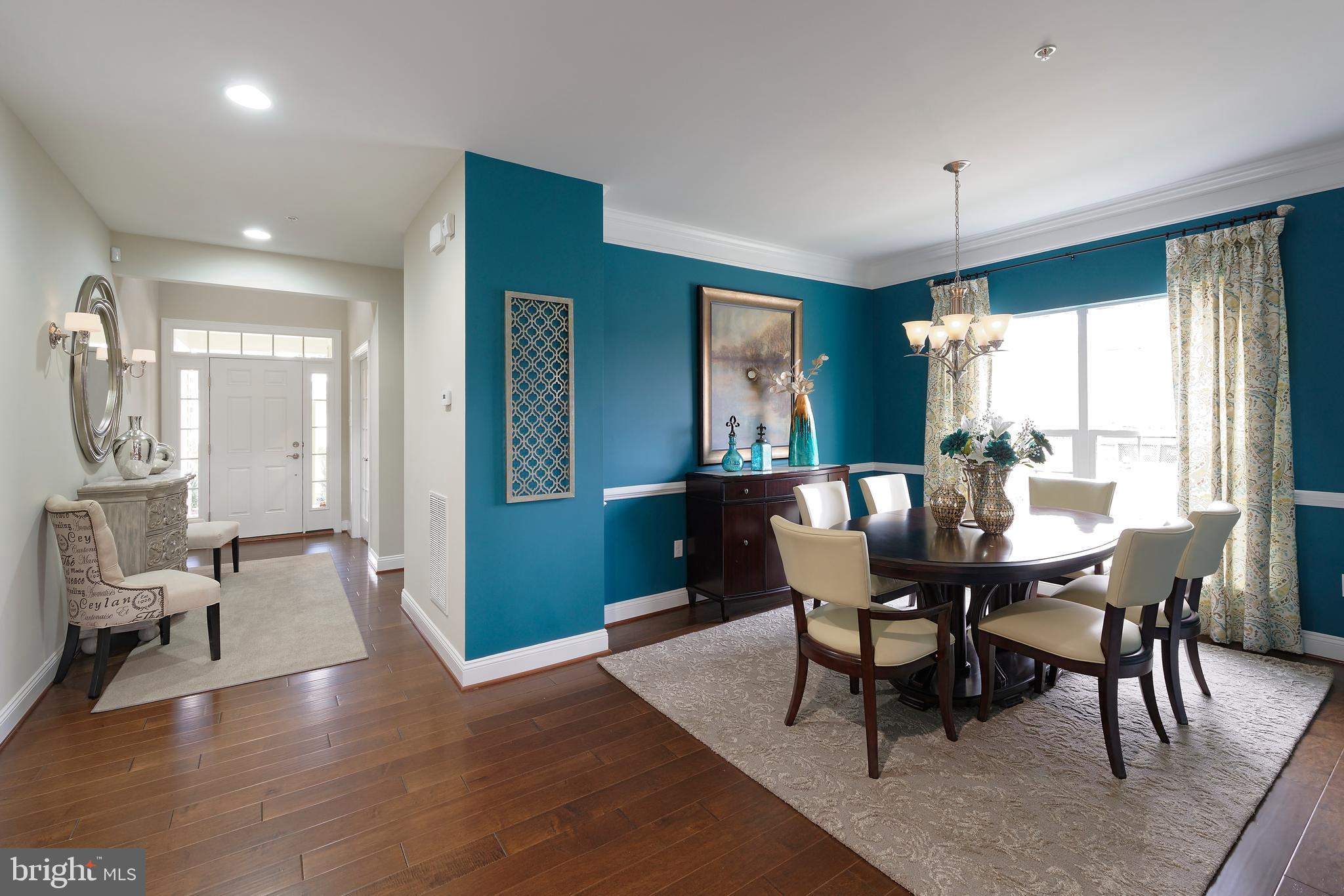 8600 Hines Circle Laurel, MD 20723 - Photo 4 of 9 a view of a a dining room with furniture window and wooden floor