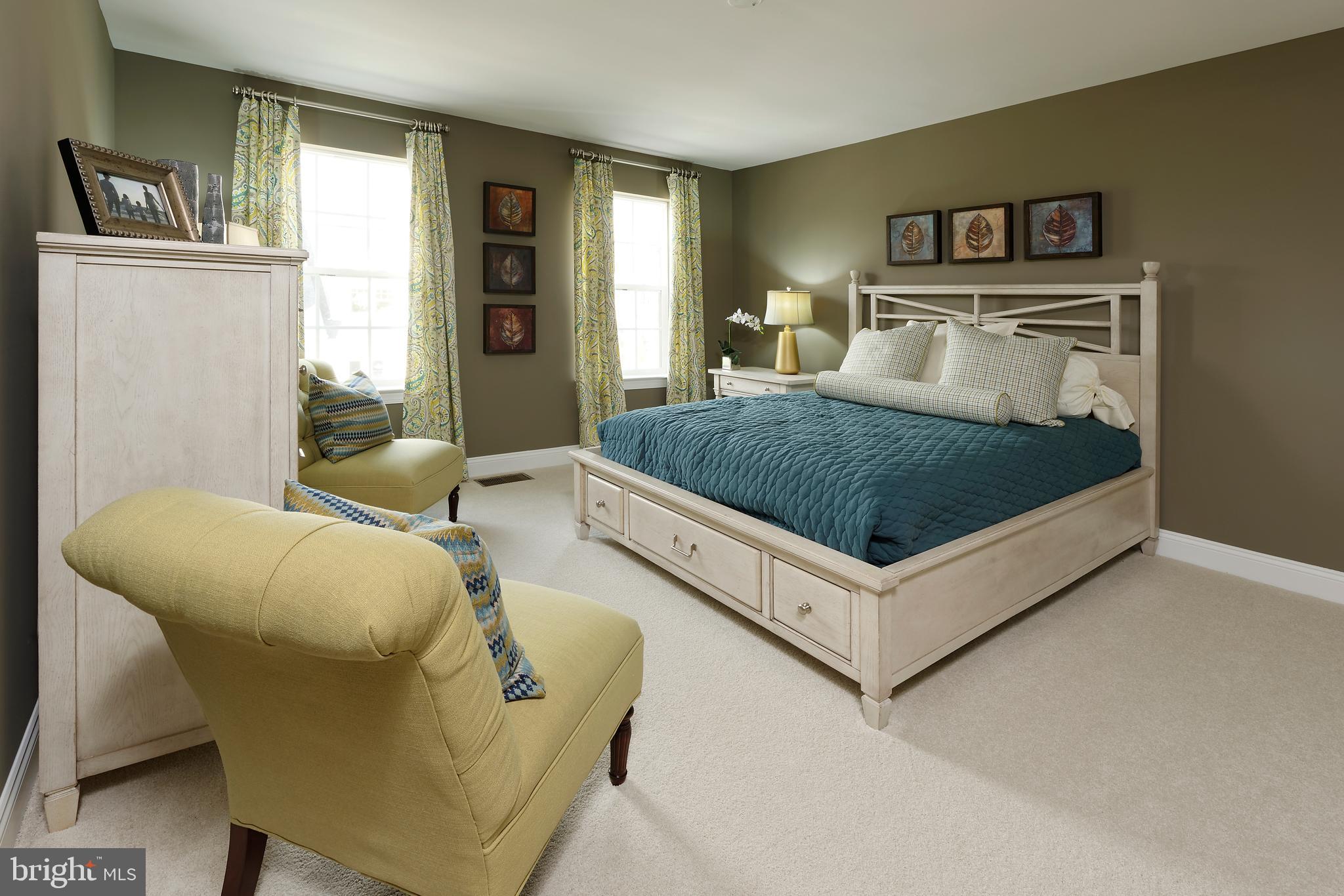 8600 Hines Circle Laurel, MD 20723 - Photo 7 of 9 a bedroom with a bed and window