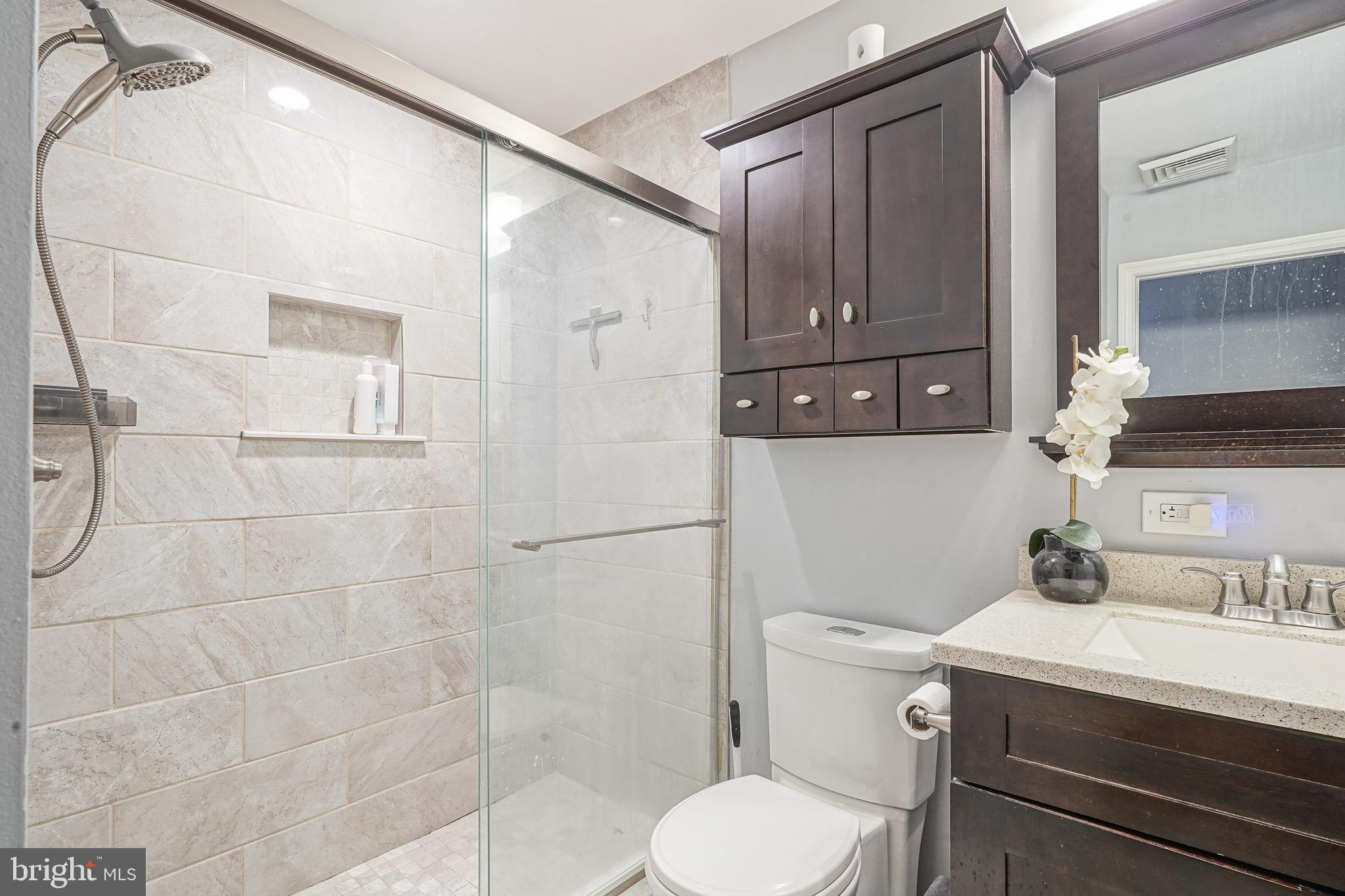 32 Strathmore Drive Cherry Hill, NJ 08003 - Photo 11 of 33 a bathroom with a sink a toilet and shower