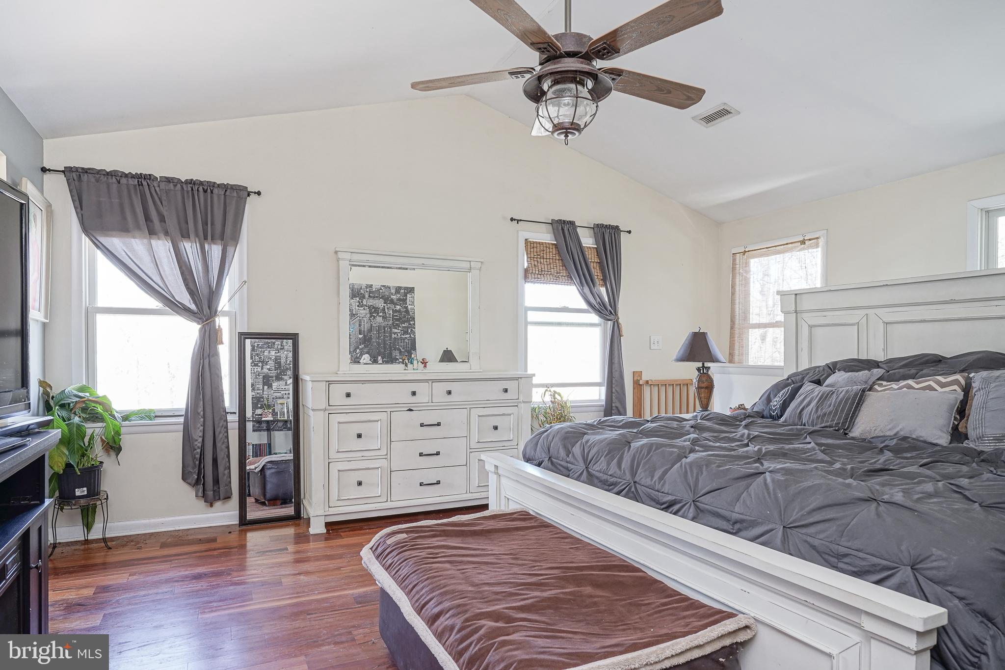 32 Strathmore Drive Cherry Hill, NJ 08003 - Photo 18 of 33 a bedroom with a bed dresser and a window