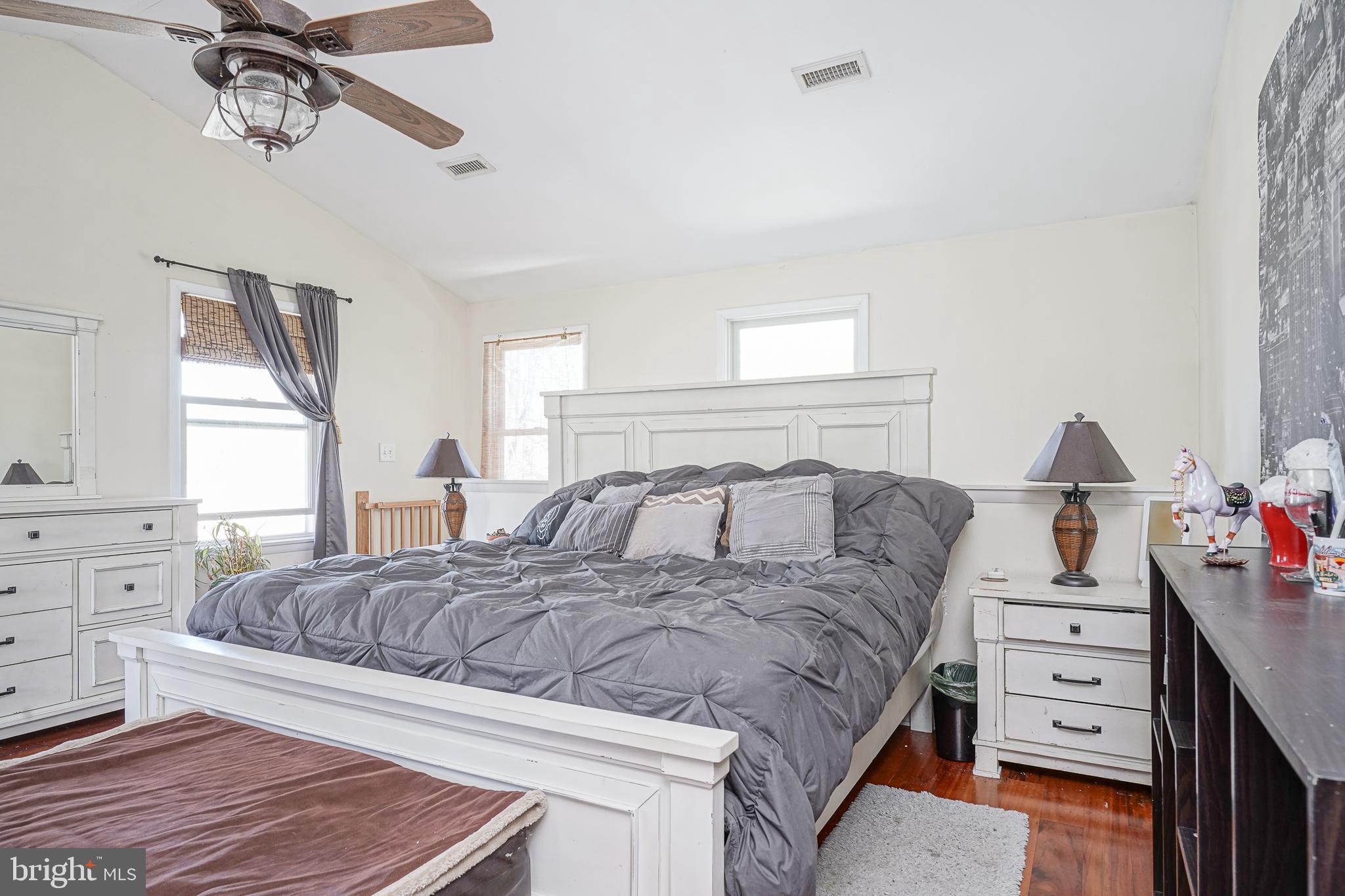32 Strathmore Drive Cherry Hill, NJ 08003 - Photo 19 of 33 a bedroom with a bed and a dresser