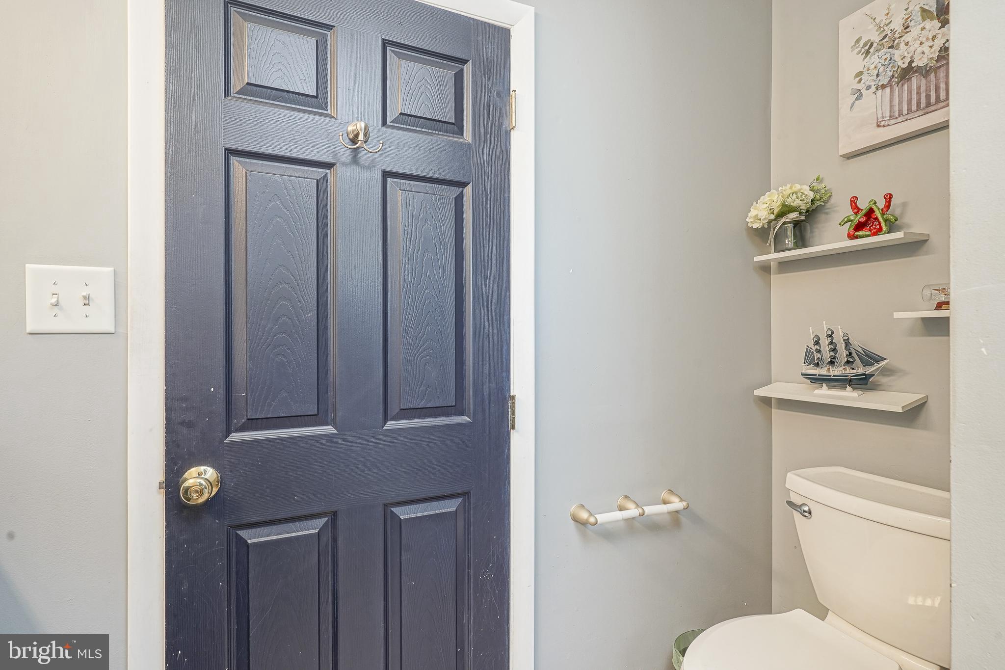 32 Strathmore Drive Cherry Hill, NJ 08003 - Photo 23 of 33 a white toilet sitting next to a bathroom sink