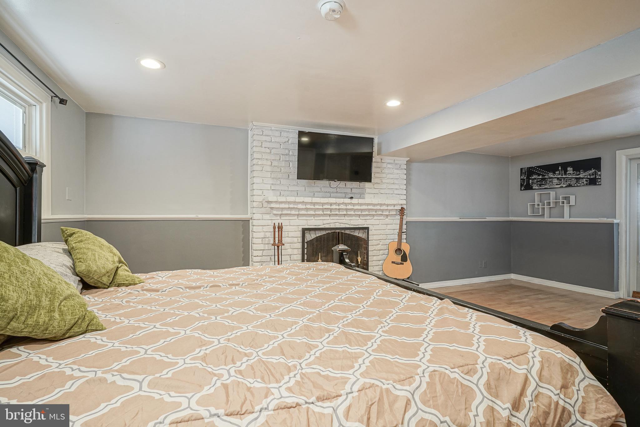 32 Strathmore Drive Cherry Hill, NJ 08003 - Photo 28 of 33 a bedroom with a large bed and a television