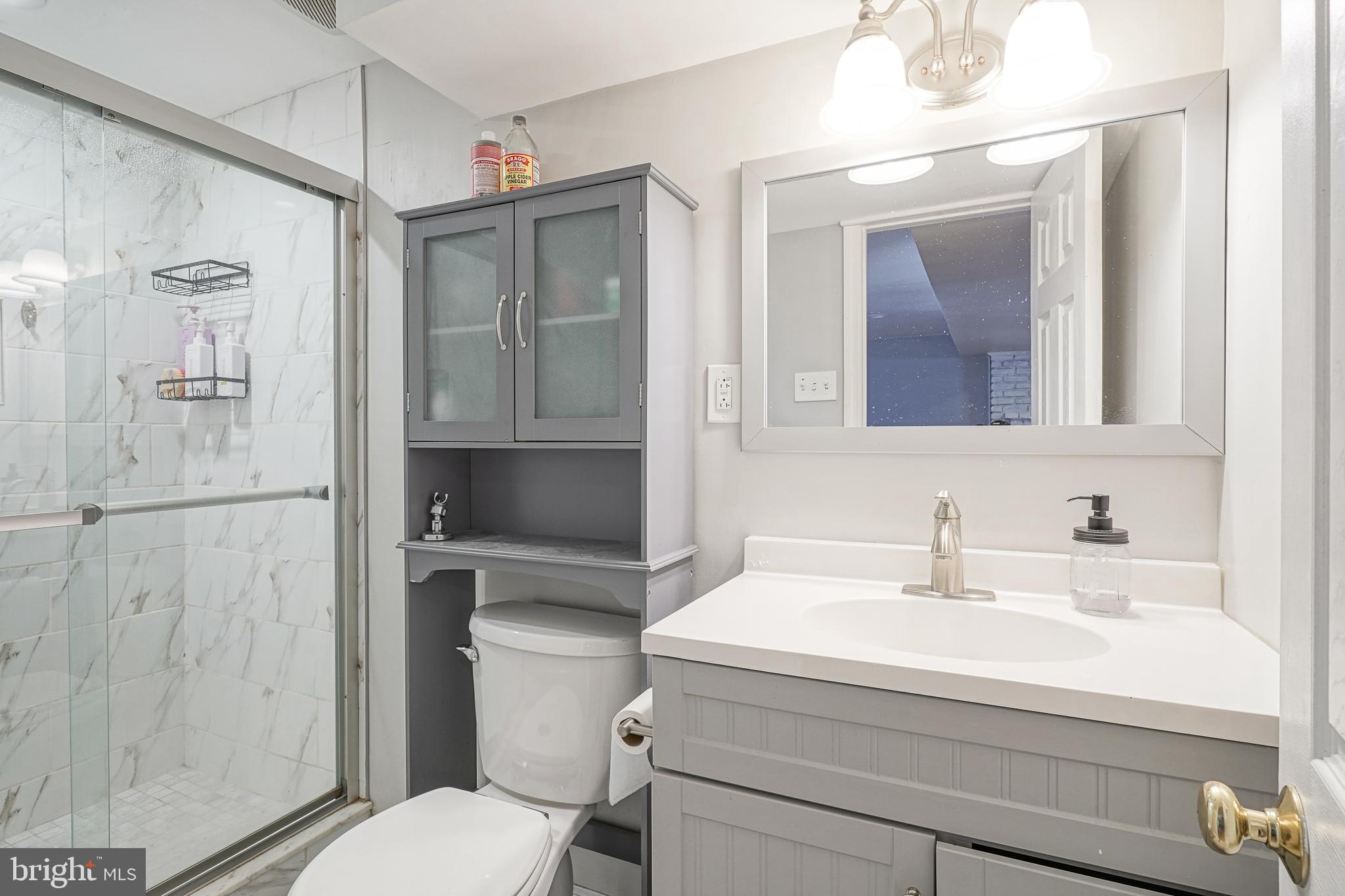 32 Strathmore Drive Cherry Hill, NJ 08003 - Photo 29 of 33 a bathroom with a sink toilet and shower