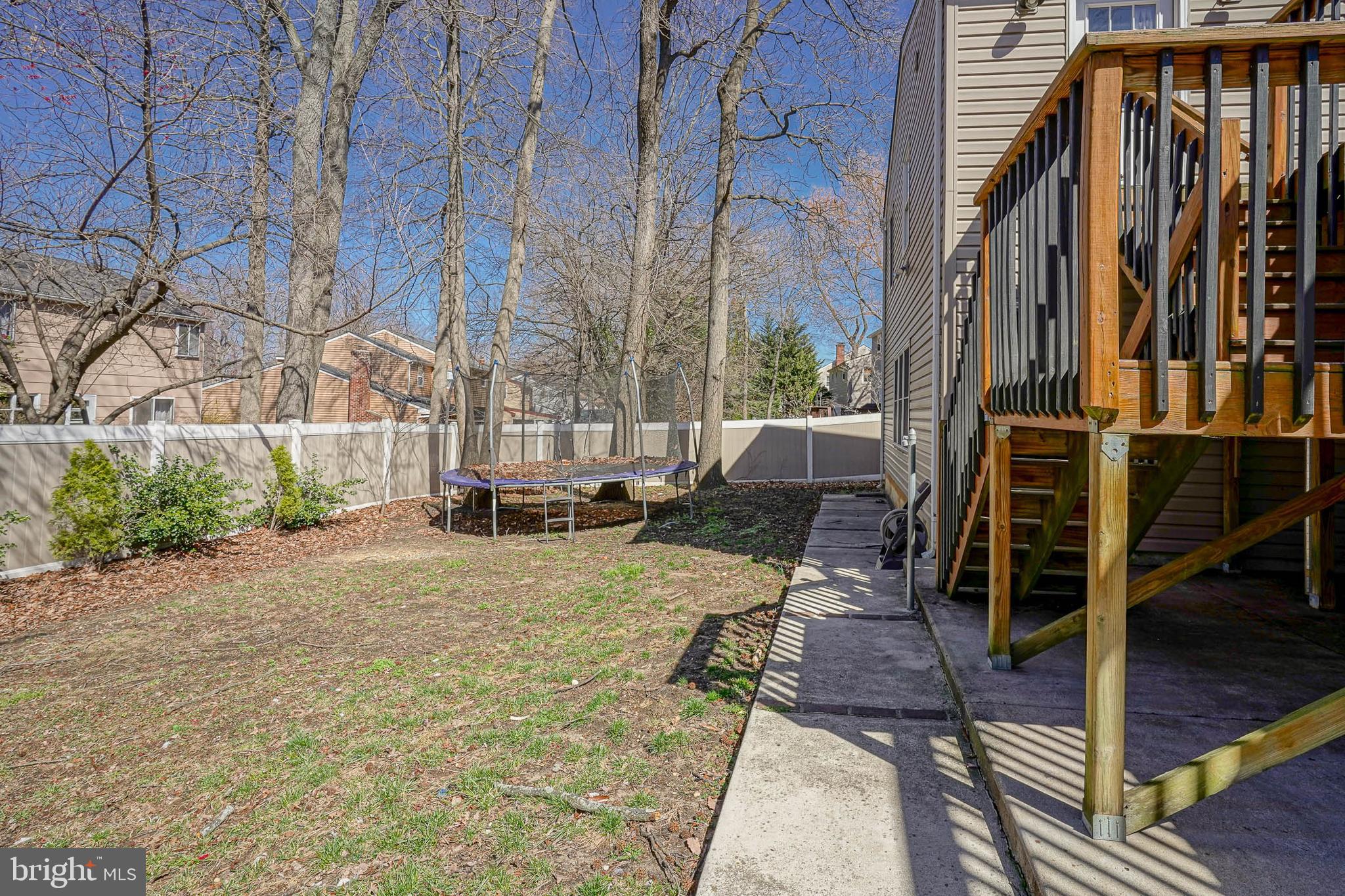 32 Strathmore Drive Cherry Hill, NJ 08003 - Photo 32 of 33 a view of backyard with wheel chair potted plants and large tree