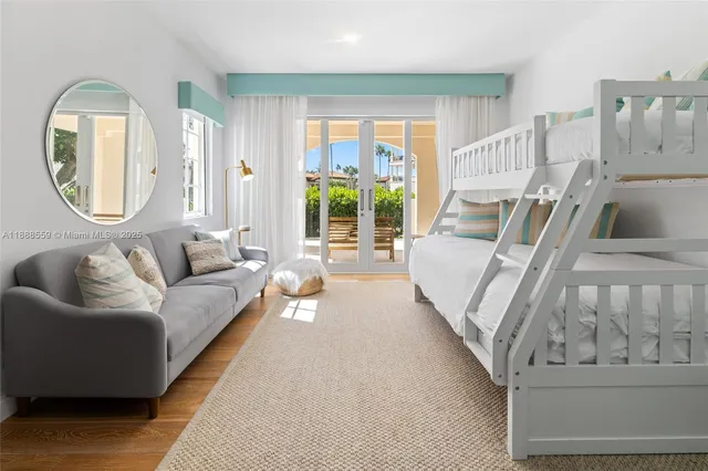 a view of a patio with table and chairs and potted plants