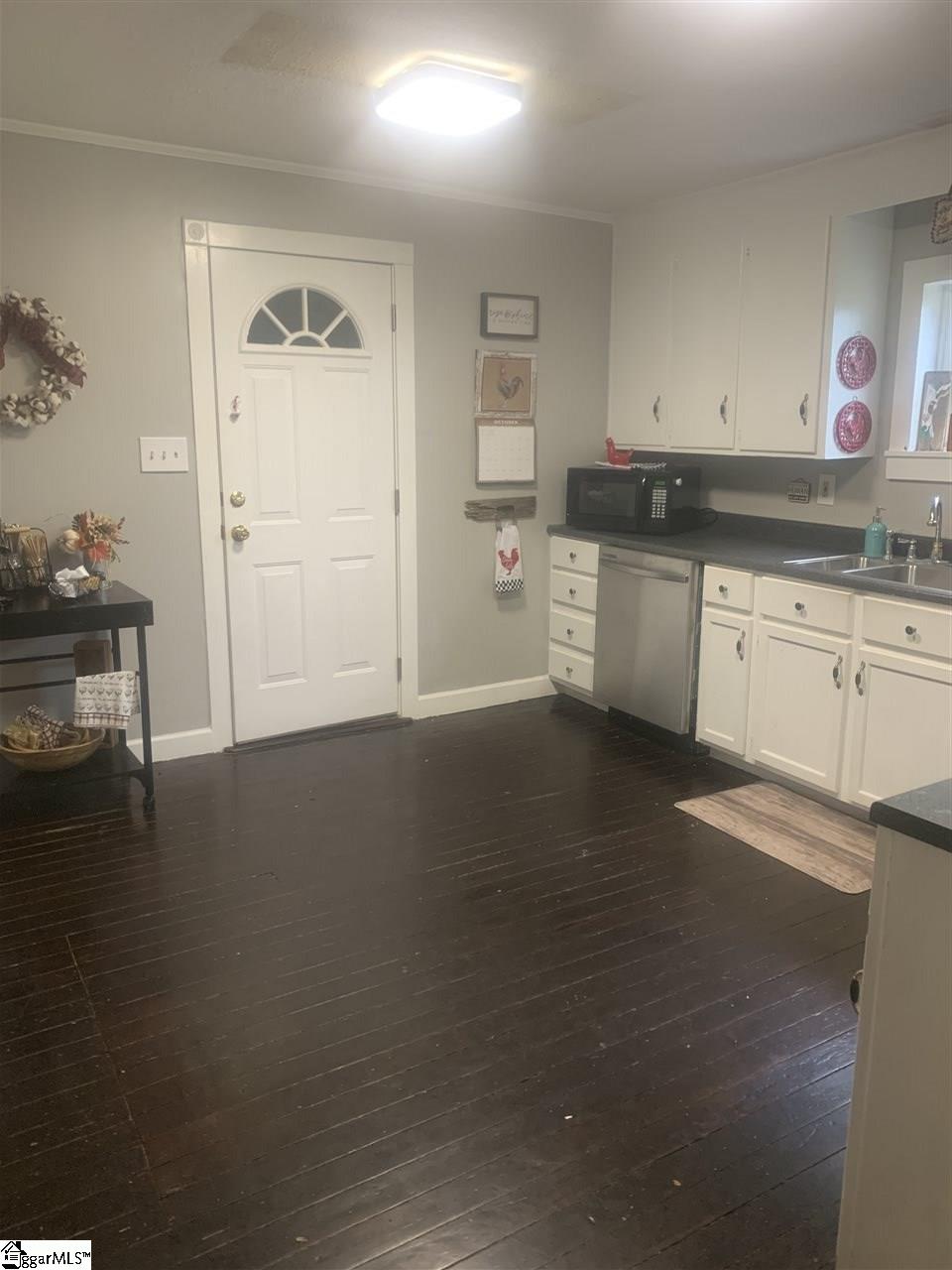 431 Barnett Road Greer, SC 29651 - Photo 14 of 18 Kitchen with laundry room door