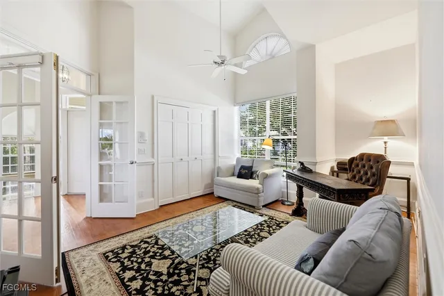 a living room with furniture and a rug