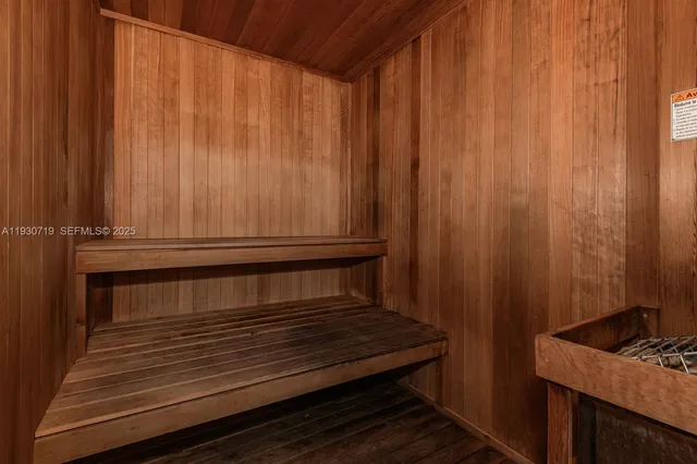 a view of a patio with dining table and chairs