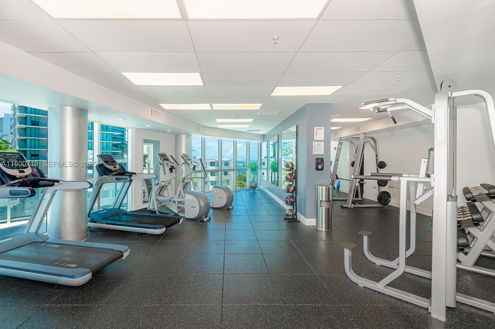 480 Northeast 30th Street, Unit 1505 Miami, FL 33137 - Photo 20 of 21 a view of a room with gym equipment