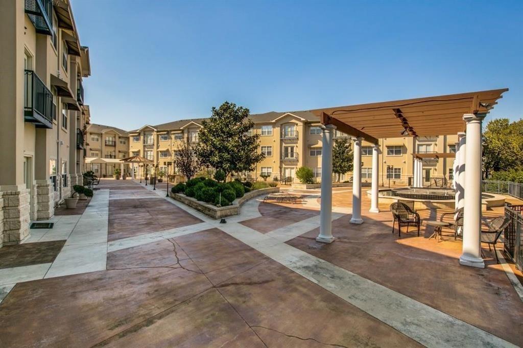 3102 Kings Road, Unit 1207 Dallas, TX 75219 - Photo 3 of 13 View of community featuring a patio and a pergola