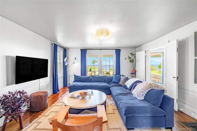 a kitchen with stainless steel appliances a stove a refrigerator and a cabinets