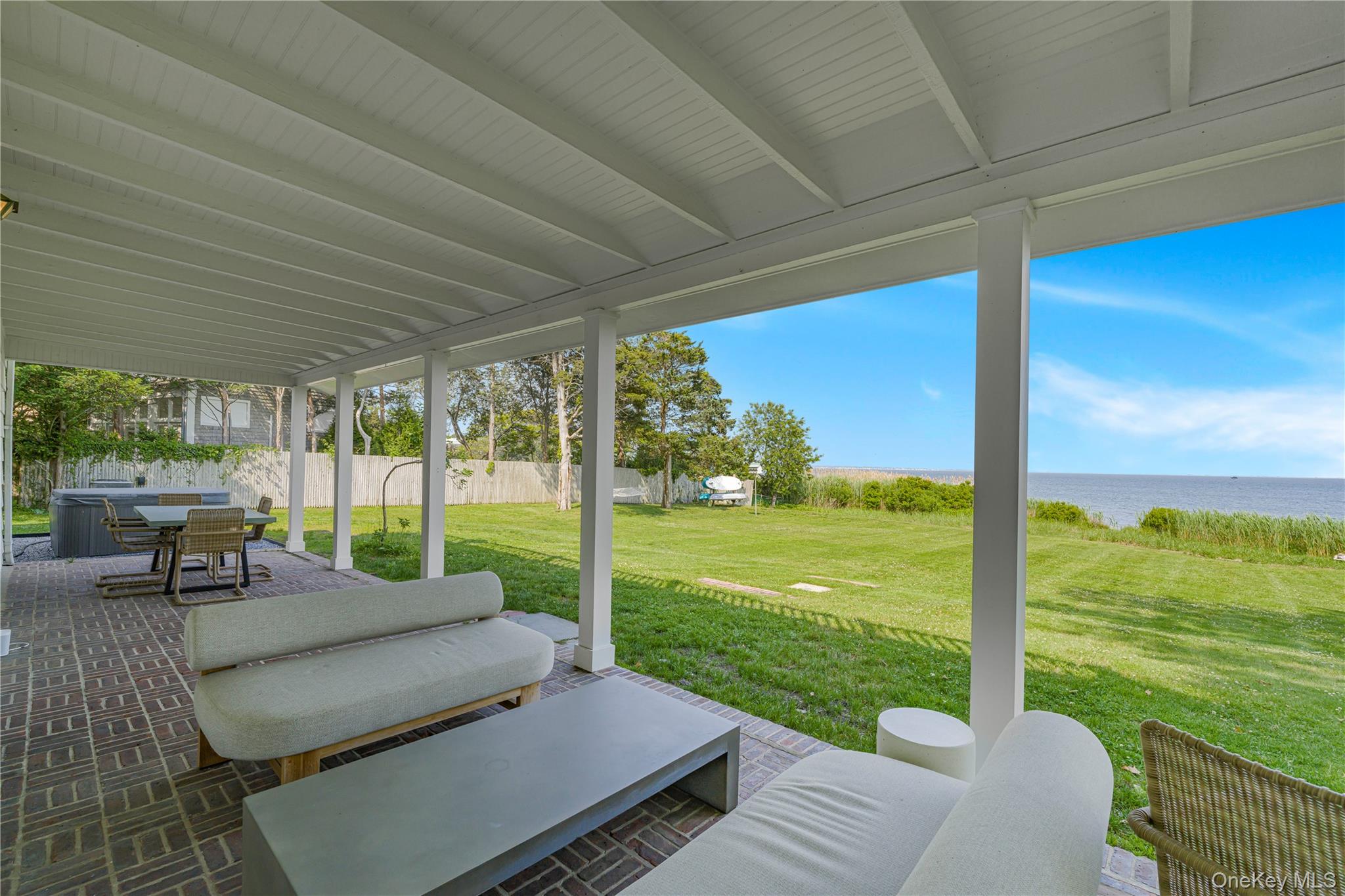 5 Thorn Hedge Road Bellport, NY 11713 - Photo 33 of 42 a view of a patio with a yard