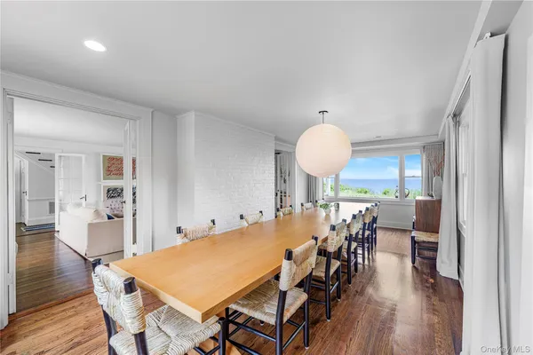 a view of a living room with a large window