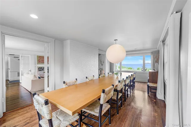 a view of a living room with a large window