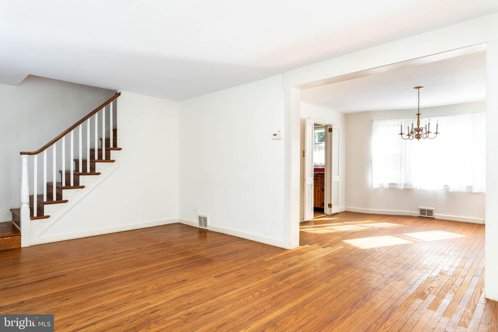 405 Sugartown Road Wayne, PA 19087 - Photo 4 of 25 Light filled Living Room and Dining Room