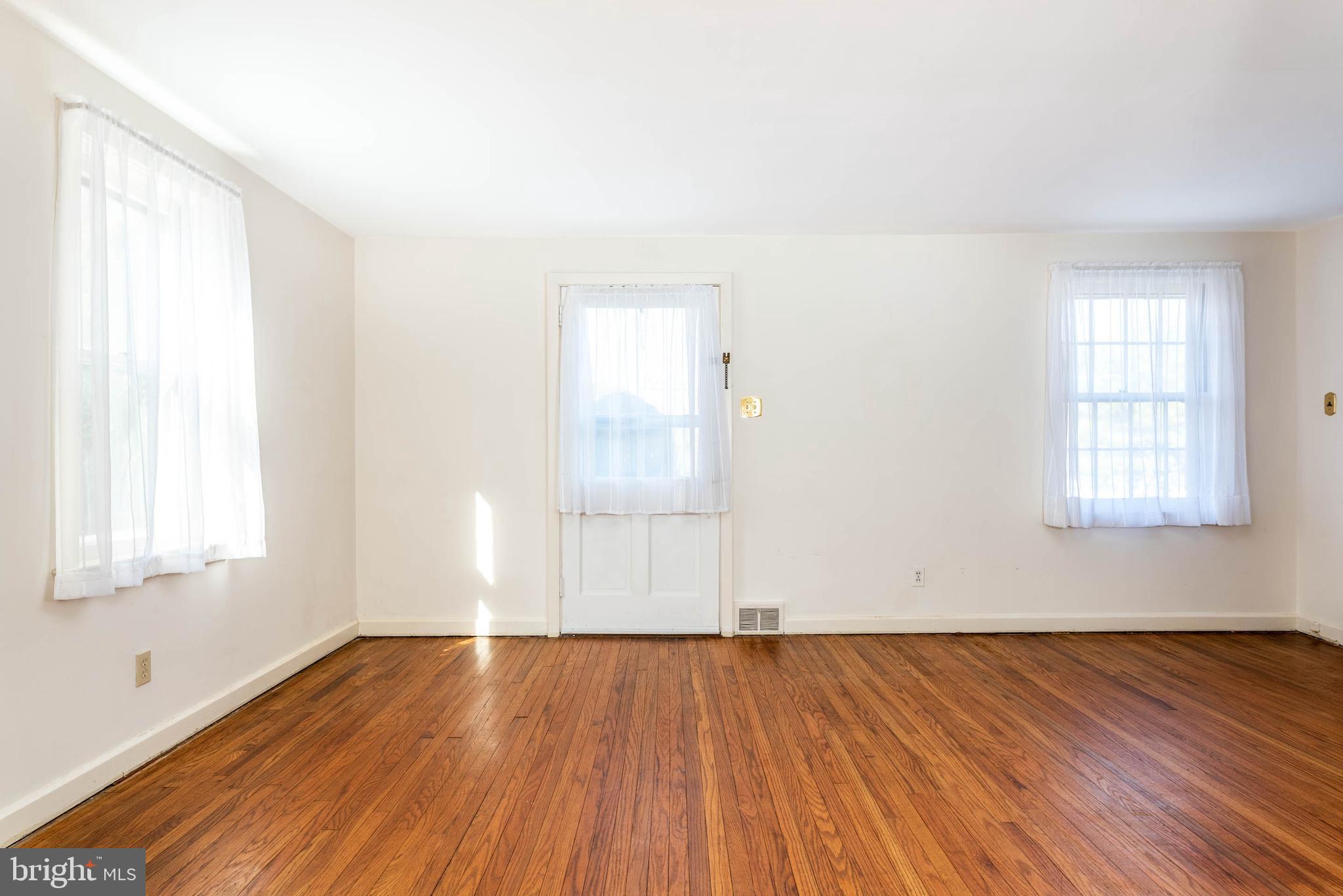 405 Sugartown Road Wayne, PA 19087 - Photo 10 of 25 Living Room with Original Hardwood Floors