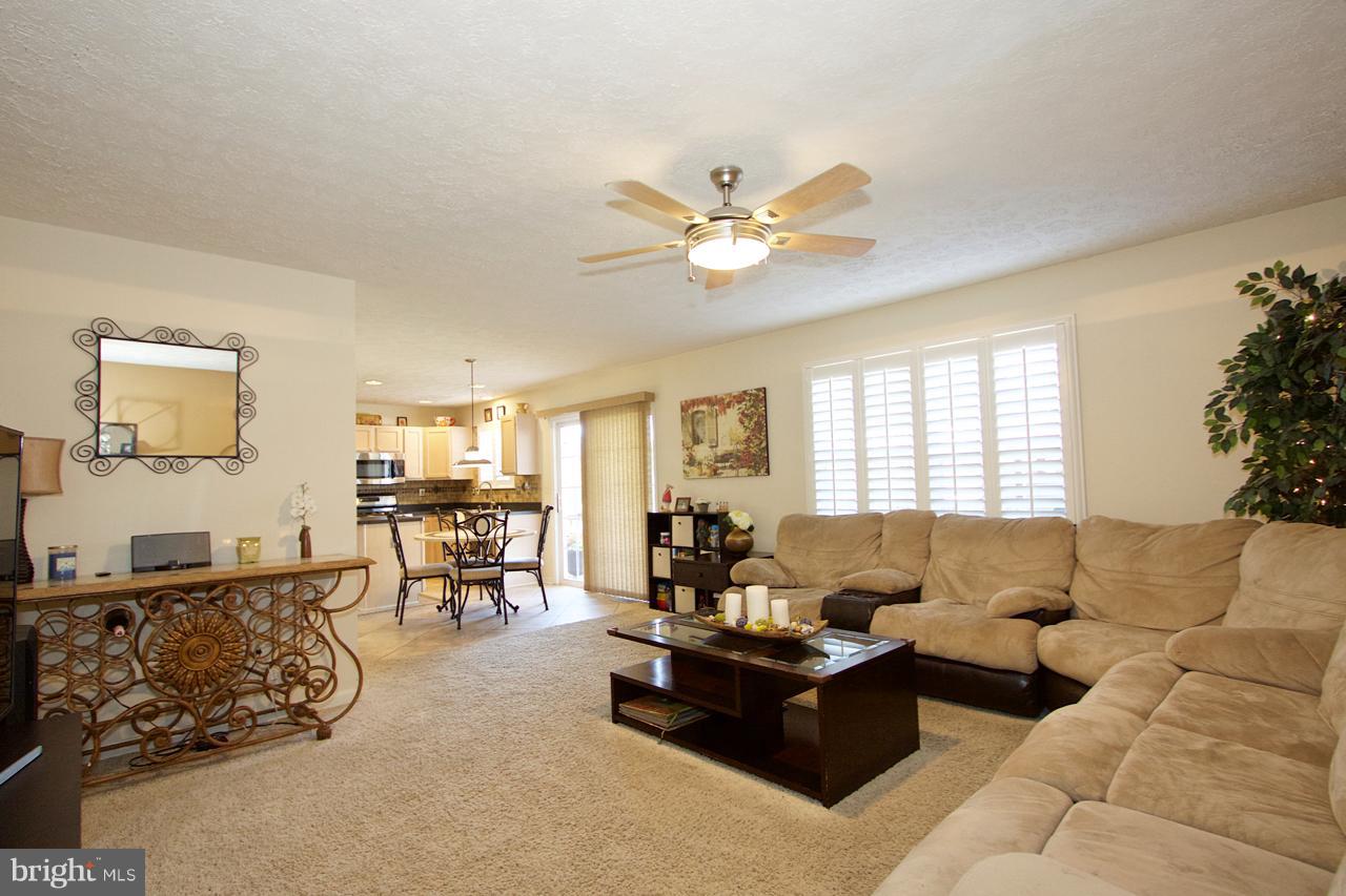 425 Spry Island Road Joppa, MD 21085 - Photo 12 of 30 Family Room with plantation shutters