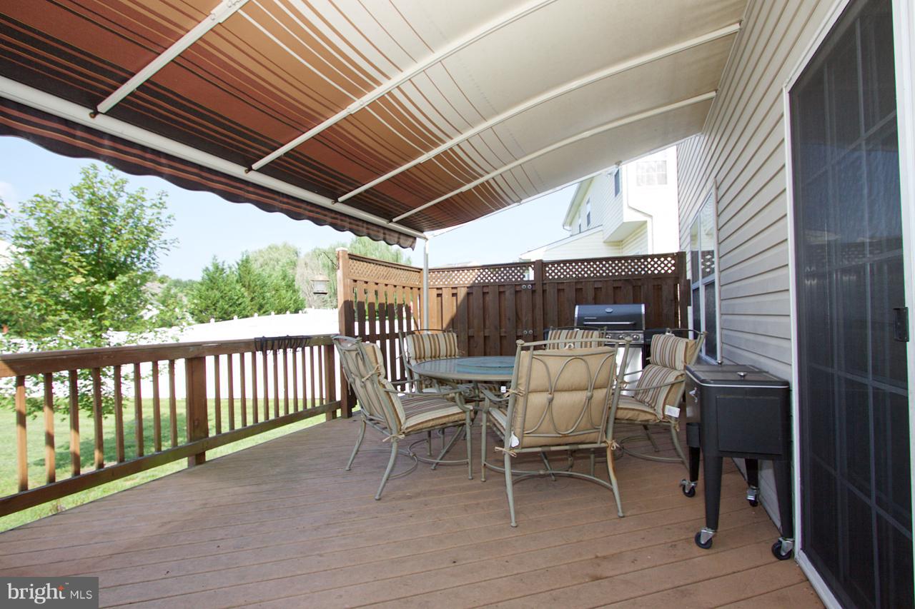 425 Spry Island Road Joppa, MD 21085 - Photo 24 of 30 Rear deck with awning
