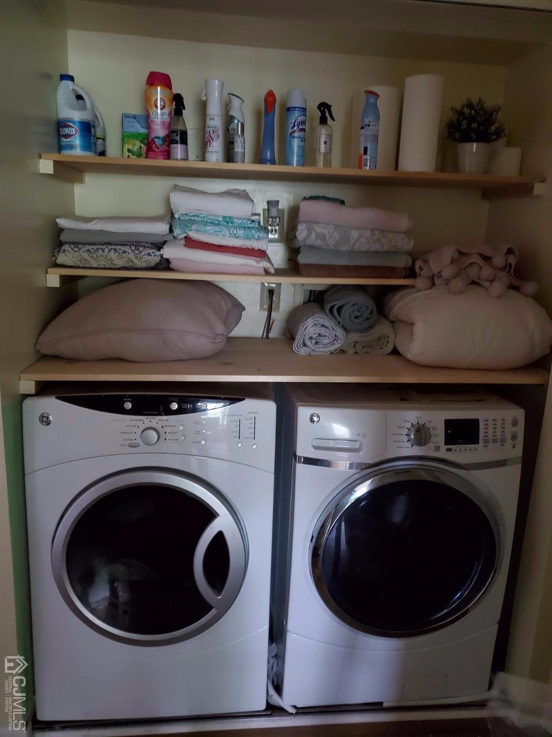 233 Edpas Road, Unit 233 New Brunswick, NJ 08901 - Photo 11 of 21 a utility room with dryer and washer