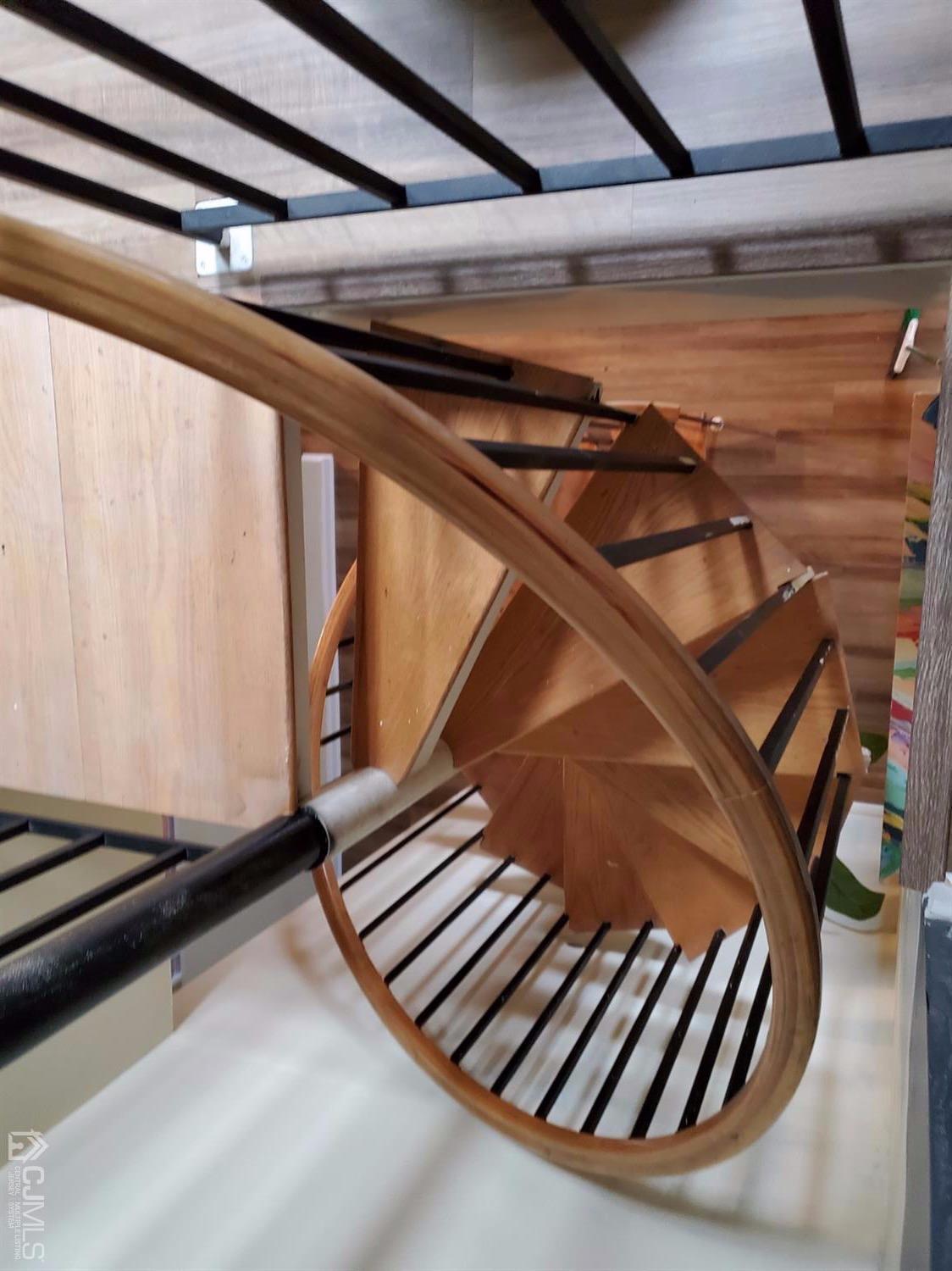 233 Edpas Road, Unit 233 New Brunswick, NJ 08901 - Photo 18 of 21 a view of a room with staircase